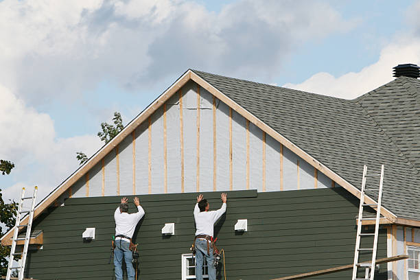 Professional Siding technician working in Long Branch, VA